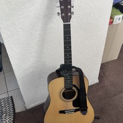 Yamaha Acoustic Guitar – Practically New With Fender clip-on Tuner FCT-2, Guitar Stand, guitar strap. LOCAL PICK-UP & CASH ONLY.