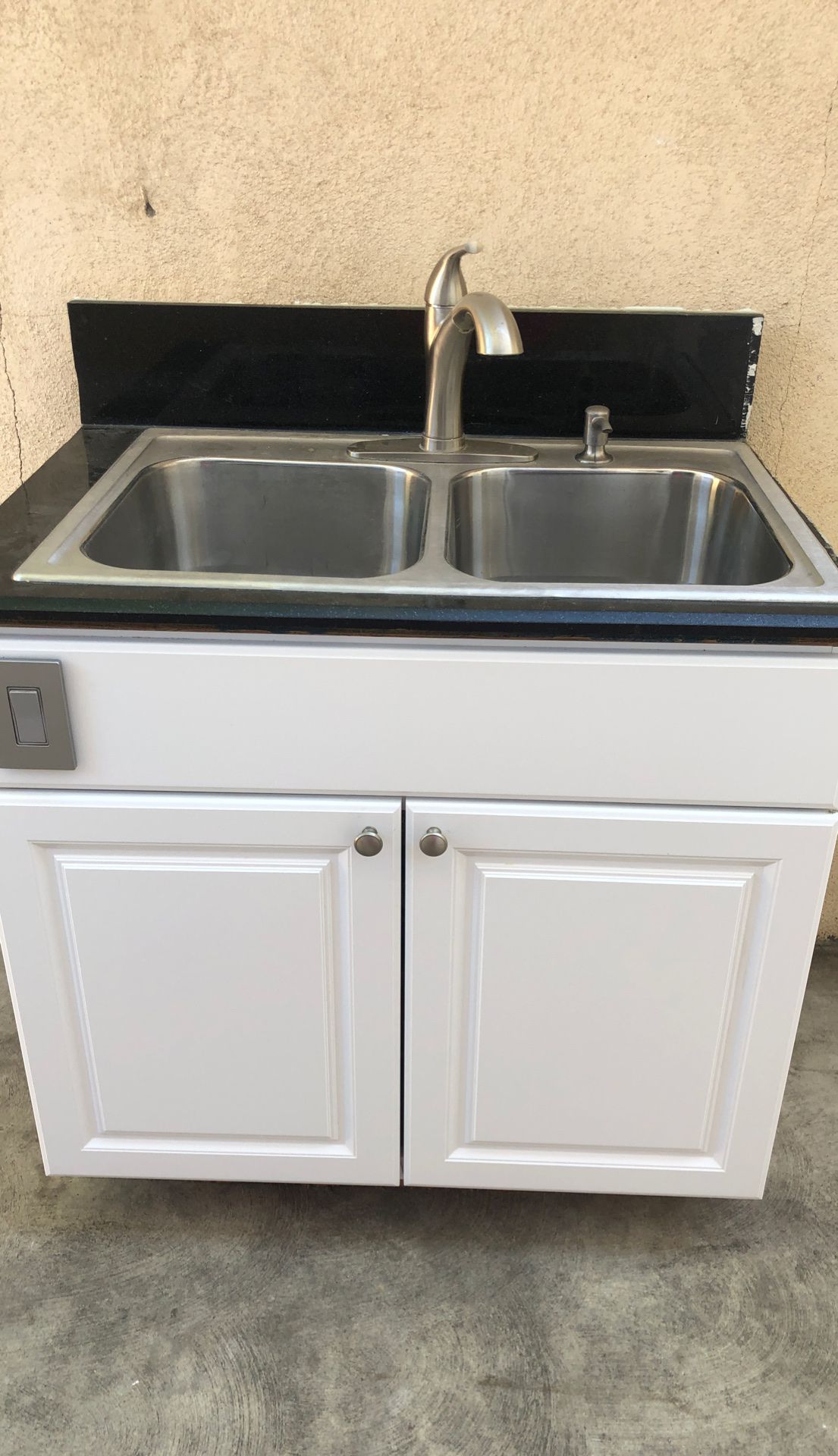 Kitchen cabinet with sink , faucet and food disposal 37” by 25”