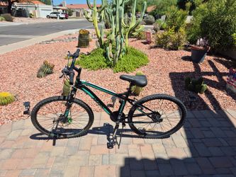 Black and Teal Huffy Nighthawk Mountain Bike