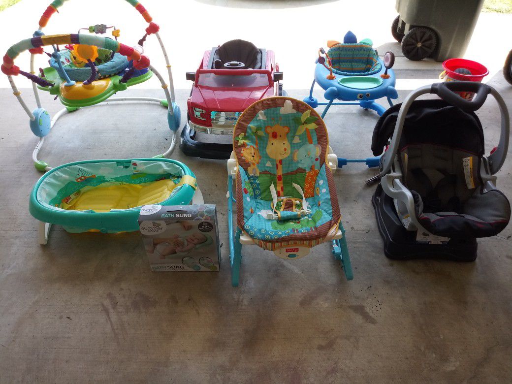 Baby bath, baby bath sling, Ford truck walker, walker, bouncer, activity bouncer, car seat. Each item priced individually