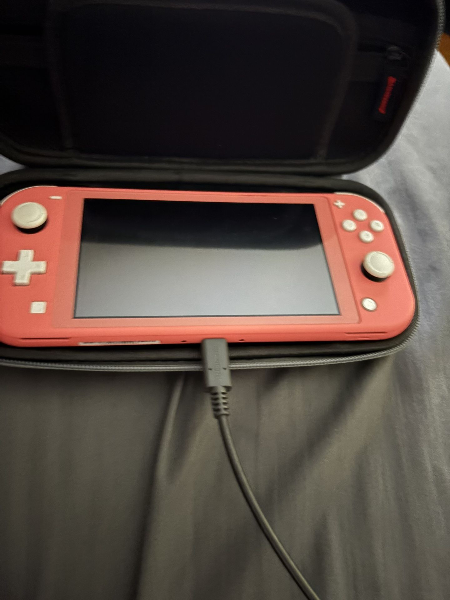Nintendo Switch Lite + Games