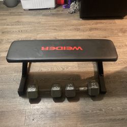 Two 50 Lb Weights And Bench 