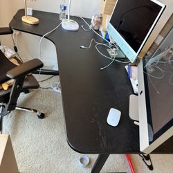Black L-Shaped Desk + Ergonomic Office Chair