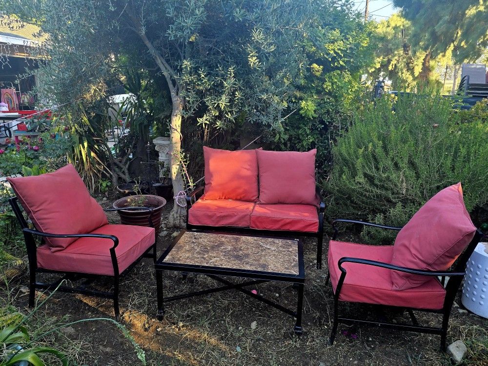 Metal Patio Set ( Bench, Two Chairs, Table And Cushions)