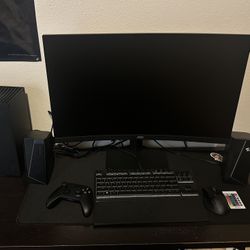 Xbox series X with 27” curved AOC gaming monitor and razor wired keyboard and wireless mouse