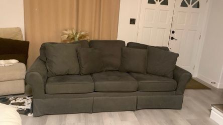 Bobs furniture long gray couch