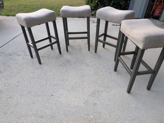 4 gray barstools
