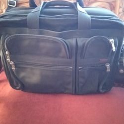 Used Black TUMI bag 