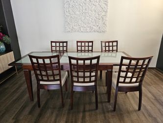 Wood And Glass Table With Slide Out Extension Seats 6 To 8