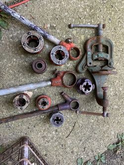 Pipe dies. For Rigid or black pipe.