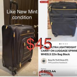 $45 Like New Lucas spinning 4 Wheels expandable Suitcase 25”x 17”x 13”