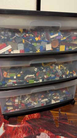35 pounds of Legos w/ container