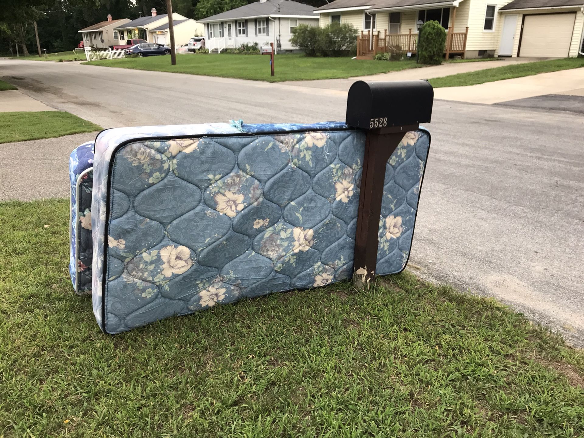 Two twin mattresses. Out by mailbox ready for pick up. Please come get .