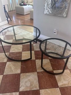 Two Piece Glass and metal coffee table set