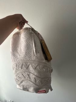 Spray ground backpack