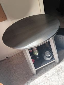 Matching coffee table and end tables.