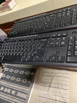 (2) Logitech Computer Keyboard Operating With (2) AAA Batteries . Reduced Each $10 Price  Firm 