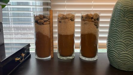 Decor vases with sand and rocks