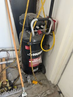 Husky Air compressor with tire gauge and hose rack