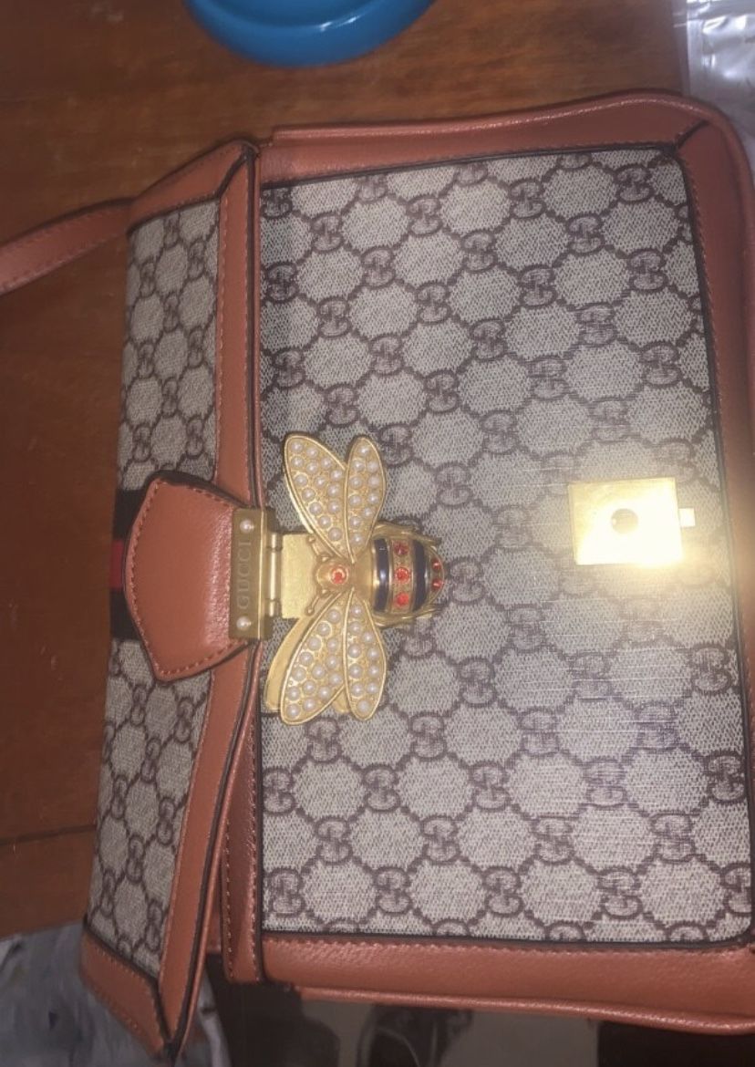 Used Gucci Strap Bag.