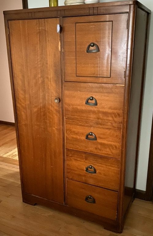 Antique tall wood dresser.