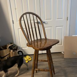 solid wood swivel chair perfect for sitting in comfort while doing dishes, cooking, etc