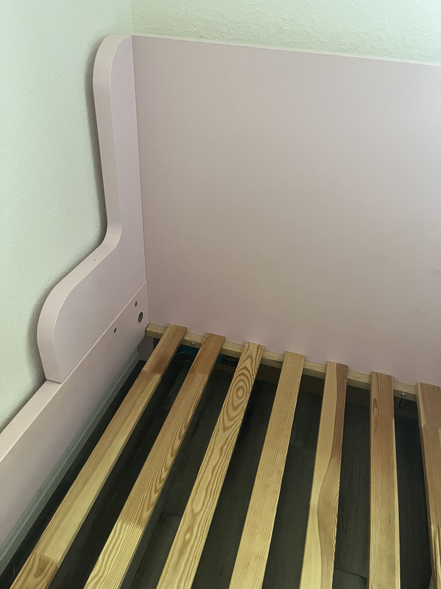 Pink IKEA BUSUNGE Kids Extendable Twin Sleigh bed, 38 1/4x74 3/4 "