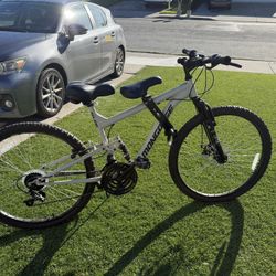 Mongoose bike with shotgun kid seat