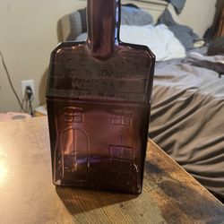 Old Purple Glass Cabin Whisky Bottle 