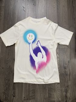 Cream and multi-coloured streetwear-inspired t-shirt, collab with jordan and j. balvon
