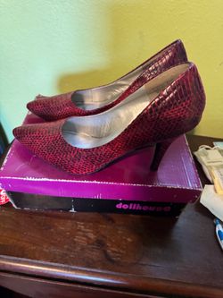 Red snakeskin heels