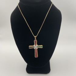 Gold tone cross pendant