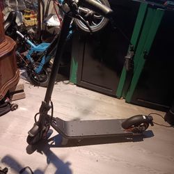 Basic 42 Volt E Scooter Has Bluetooth 