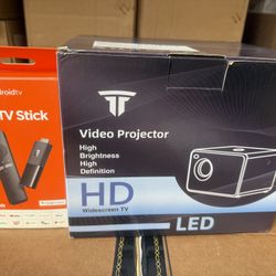 Tv Stick And A Mini Projector 