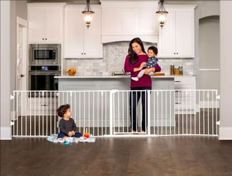 Used baby gate 11 panels including 2 doors