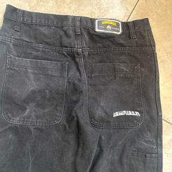low rider black thug jeans lokey wide leg too