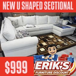 NEW SECTIONALS FREE RUG AND FREE DELIVERY 