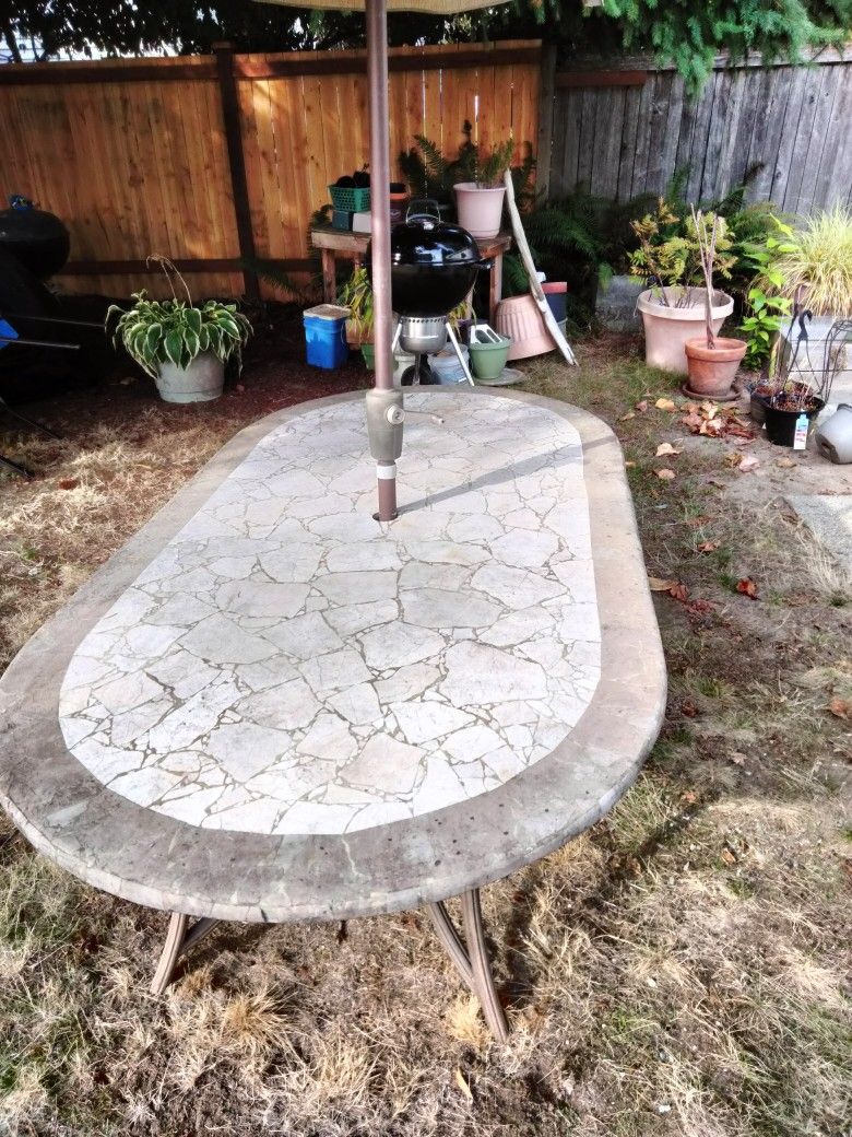 Stone Table W/ Umbrella  Need Pickup to move