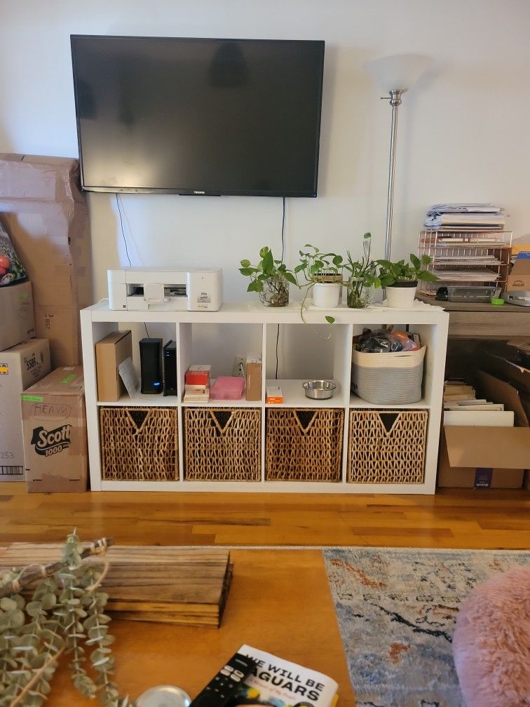 TV console with wicker baskets