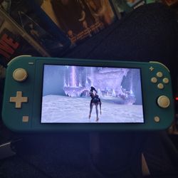 Nintendo Switch Lite With 8 Games