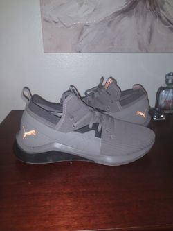 Gray/ orange mens Puma shoes size 9.5