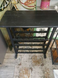 Black wood wine bottle stand