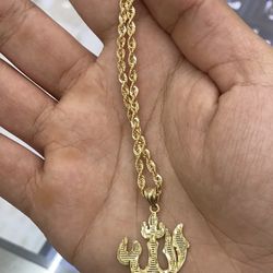 10k Gold Rope Chain And Pendant 