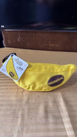 Bananagrams Classic Word Game, 144 Tiles in Banana Pouch, Travel Game