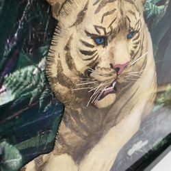 Very unique 1 of a kind 3-D effect beautiful hand sculpted and hand painted White Tiger enclosed in a very expensive shadow box.   Set in a high quali