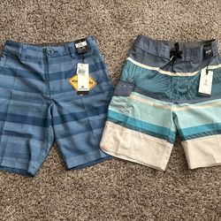 New with Tags! Two pairs of Rip Curl boys swim trunks suit (size 24)