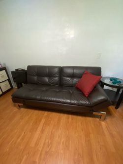 Brown faux leather sofa bed