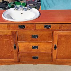 Bassett Custom Made Bathroom Vanity Cabinet with American Standard Sink and Moen Faucet