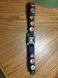 Belt made of leather car seat buckle and beer bottle caps