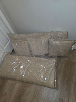Brand new, never used replacement couch cushions and throw pillows. Still sealed in their original factory plastic packaging! Beautiful neutral beige